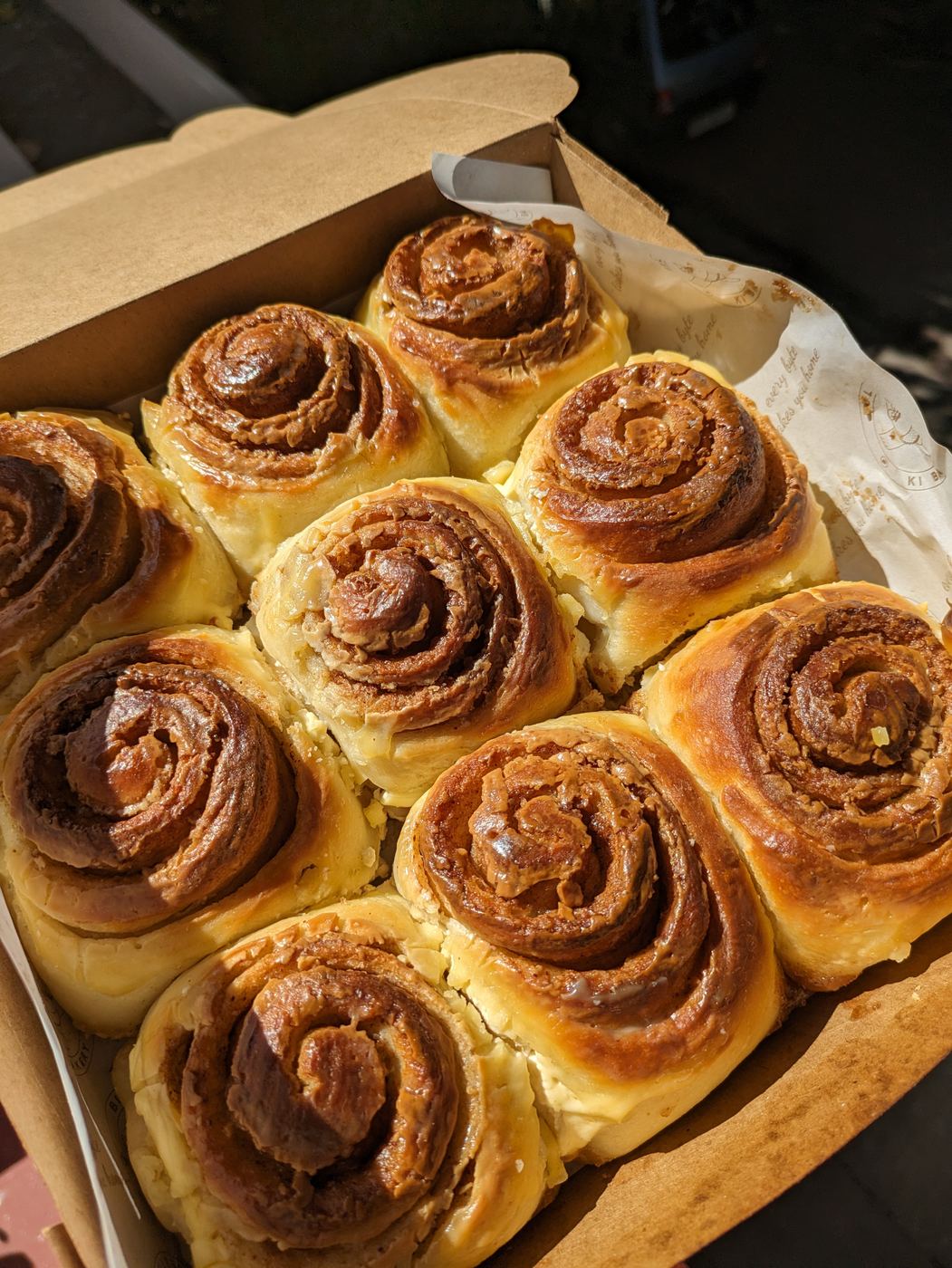Box of fresh cinnamon rolls